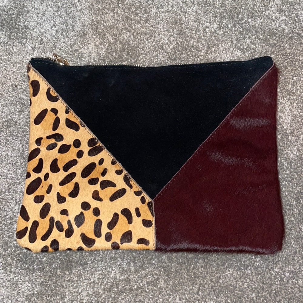 Leather leopard print clutch bag